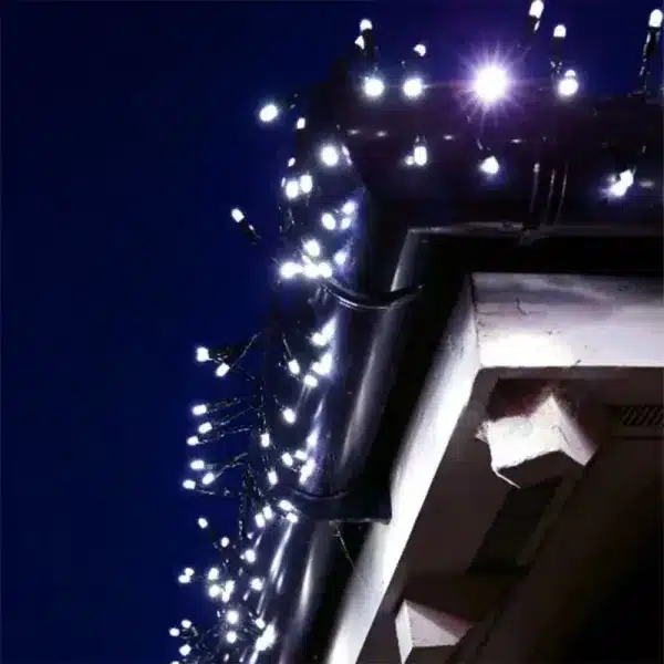 300 low voltage connectable LED cluster Christmas lights in ice white on roofline