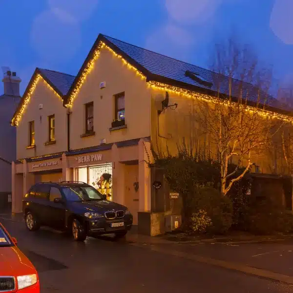600 LED connectable cluster Christmas lights warm white roofline installation