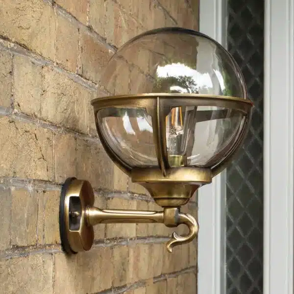 Antique globe lantern outdoor wall light on entrance wall