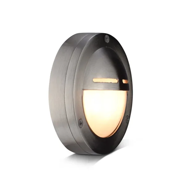 Solid Brass round outdoor wall light in nickel finish side lit angle