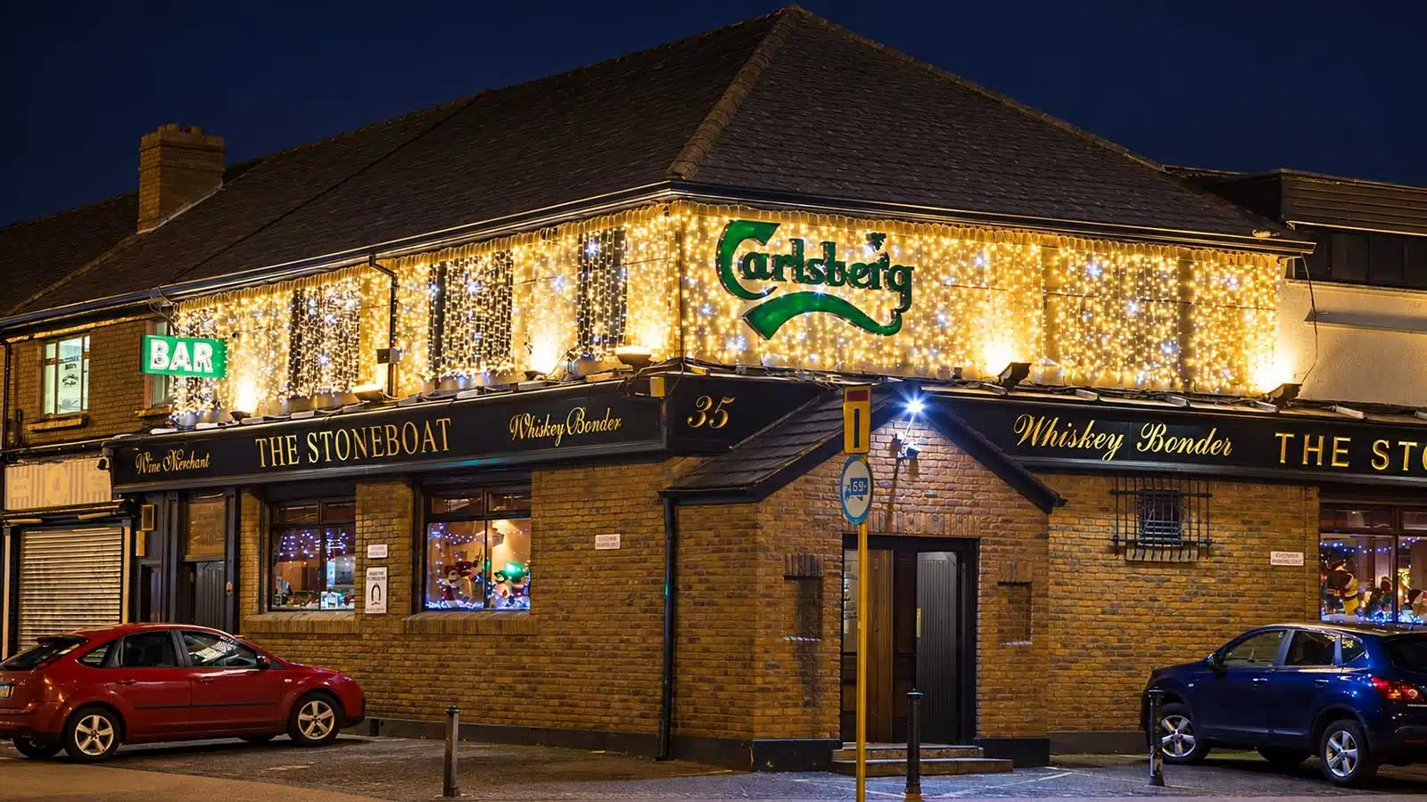 LED Curtain Lights 1.5M Warm White With Ice White Flash in a Christmas display