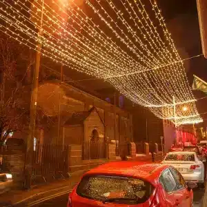 LED connectable curtain Christmas lights in 10m drop warm white ceiling display
