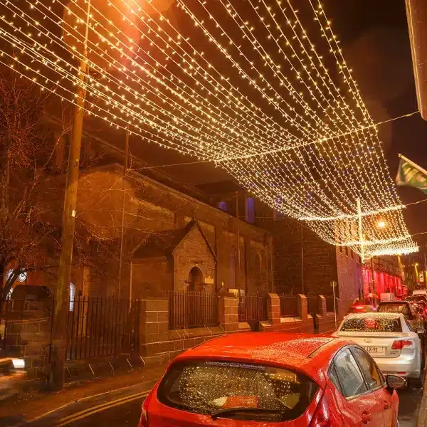 LED connectable curtain Christmas lights in 10m drop warm white ceiling display