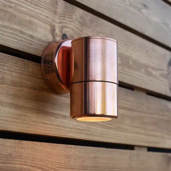 Down outdoor wall light made from natural copper exterior display