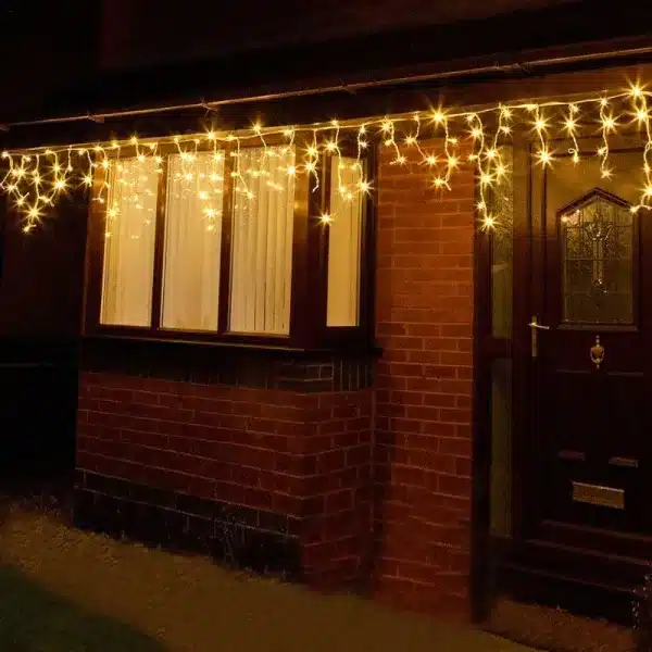 Outdoor LED icicle Christmas lights warm white outside house