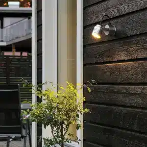 Silver outdoor wall light outside house display