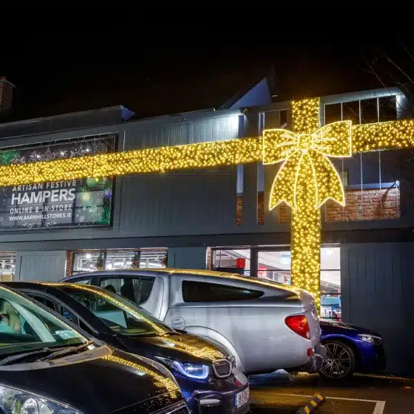 Giant gold bow 2D Christmas decoration Barnhill Stores Dalkey project display