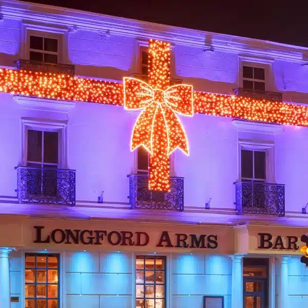 Giant red bow 2D Christmas decoration Longford arms hotel close up view