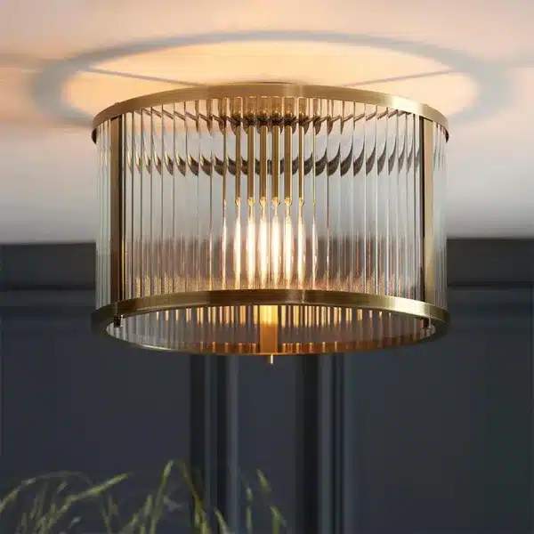 Antique brass flush ceiling pendant light with clear ribbed glass close up