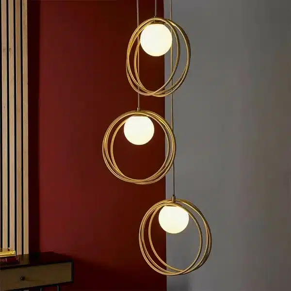 Brushed gold pendant light with opal glass shades product view
