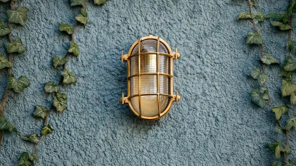 Coastal outdoor lighting that withstands the elements in timeless brass & nickel designs