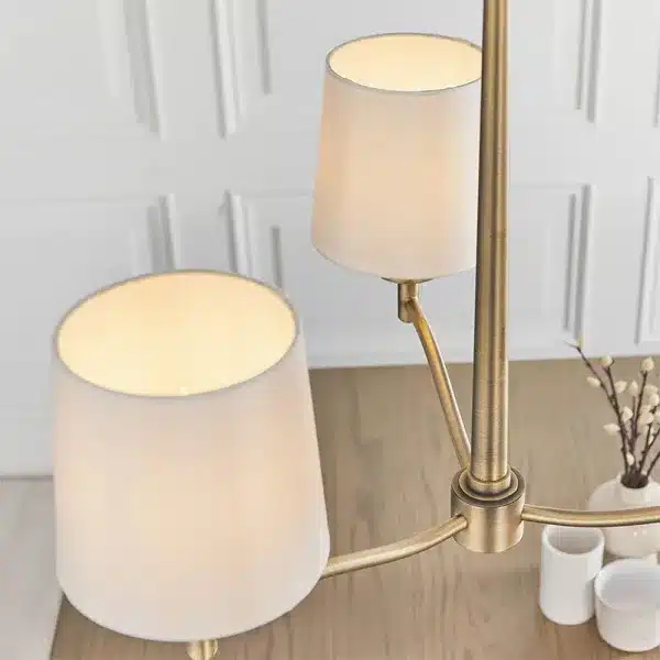 matt antique brass pendant light faux silk shades close up