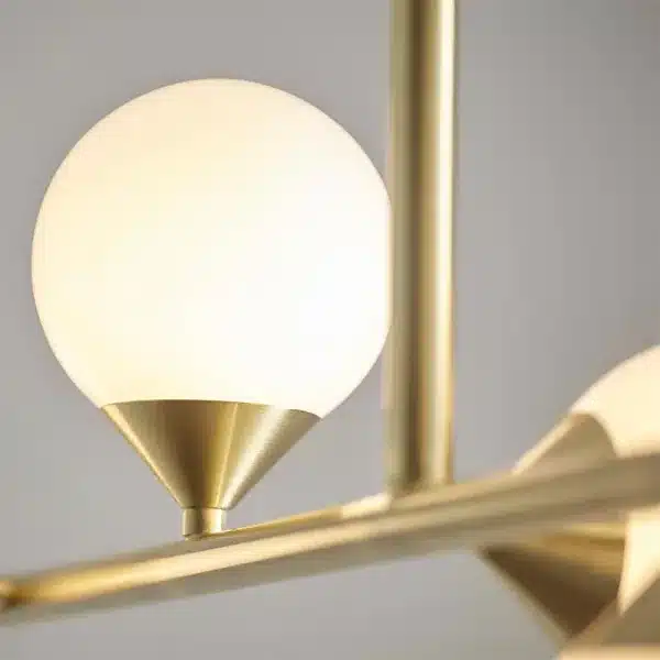 Modern satin brass linear bar pendant light glass shade detailing
