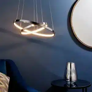 Polished chrome twin hoop LED pendant light in living room