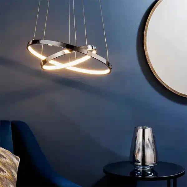 Polished chrome twin hoop LED pendant light in living room