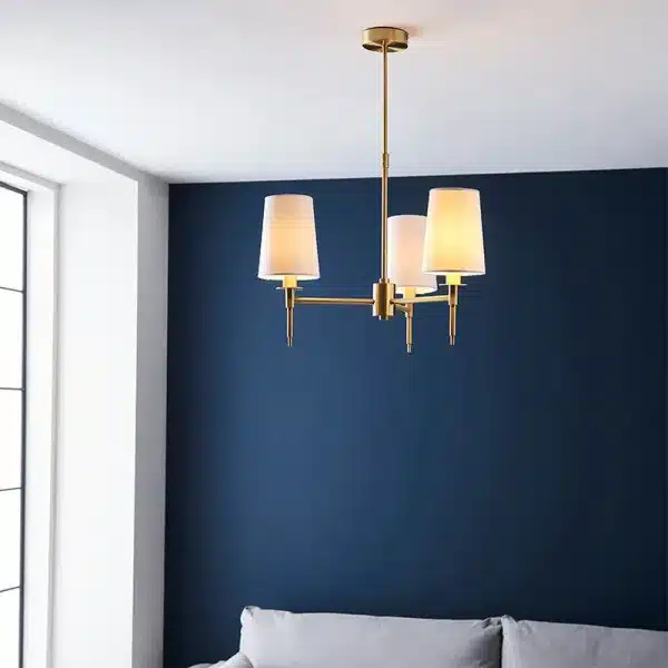 Satin brass pendant light in living room close up