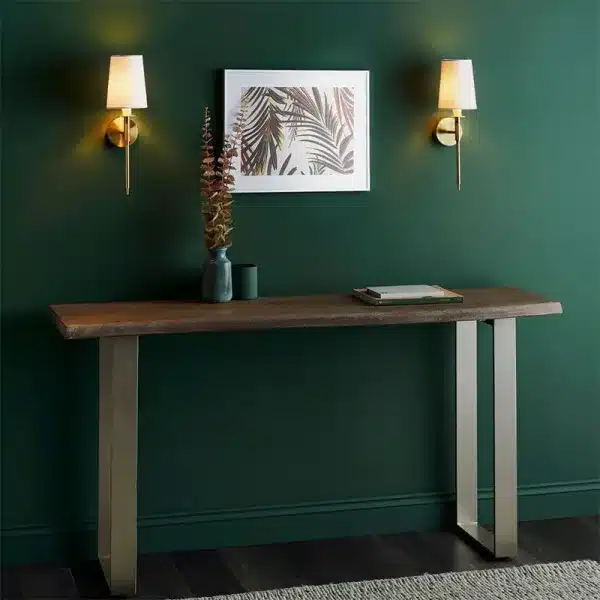 Satin brass wall lights pair on wall with painting