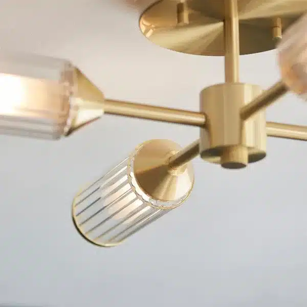 Semi flush ceiling light with ribbed glass shades satin brass finish