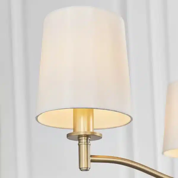 White faux silk shade view of matt antique brass pendant light