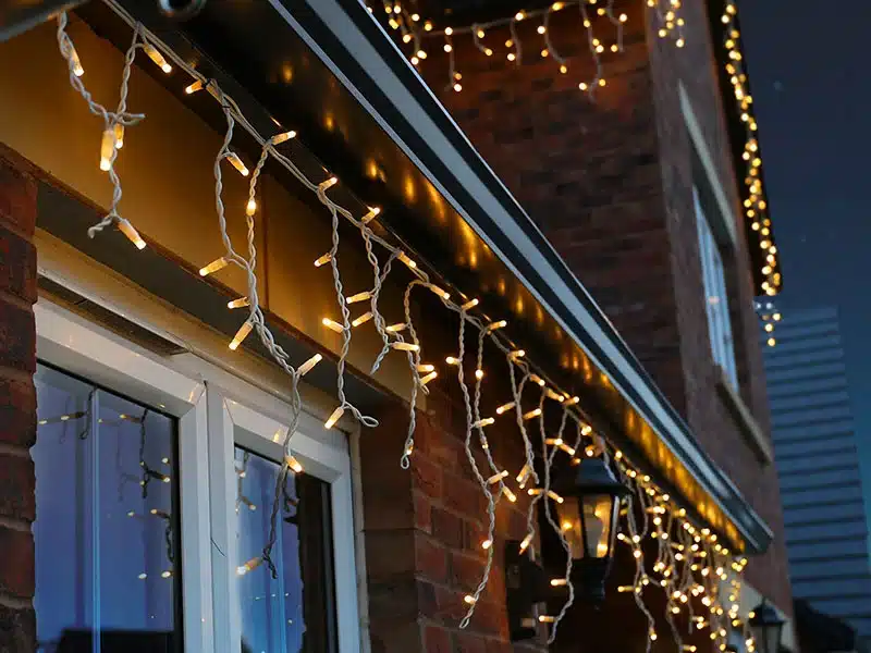Outdoor LED icicle Christmas lights warm white ideal for rooflines, gutters and eaves