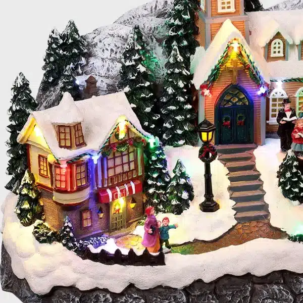 Animated Christmas village scene with Santa on his sleigh detailed view