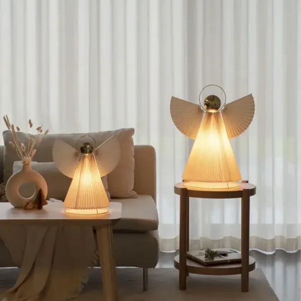 Paper angel Christmas table top decorations in brass finish
