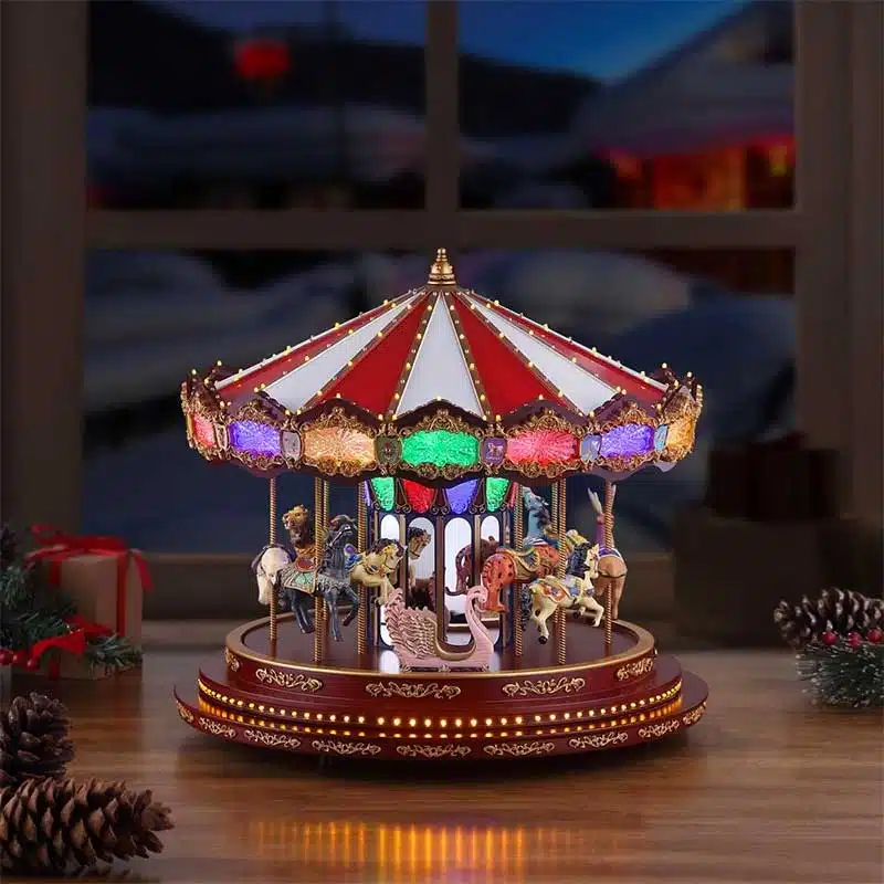 Animated-Christmas-Carousel-Decoration Animated Christmas carousel with decorative horses and warm white LED lights