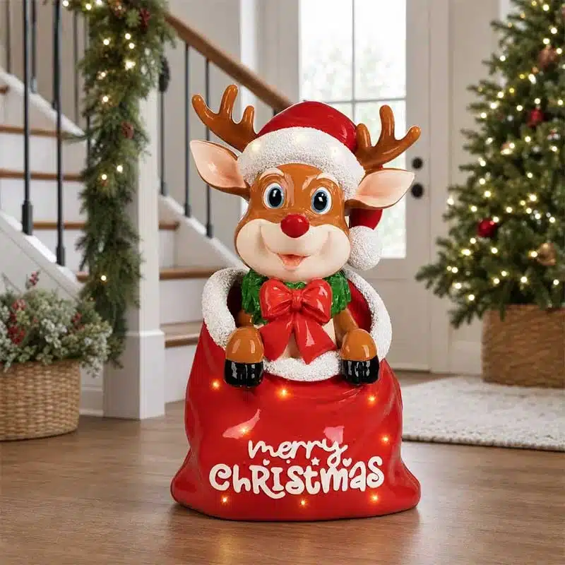 Funny-Reindeer-in-Christmas-Sack-Decoration Funny Christmas reindeer sitting in a red Merry Christmas sack with warm white LED lights