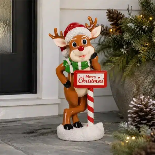 Funny standing reindeer holding a Merry Christmas sign with warm white LED lights
