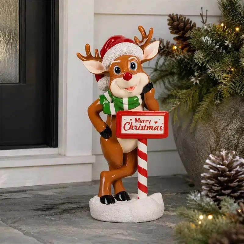 Funny-Reindeer-with-Christmas-Sign-Decoration Funny standing reindeer holding a Merry Christmas sign with warm white LED lights