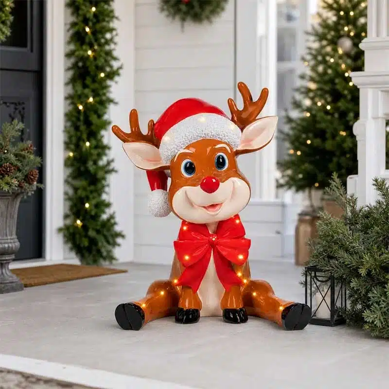 Funny-Sitting-Christmas-Reindeer-Decoration Funny Christmas reindeer decoration sitting at entrance